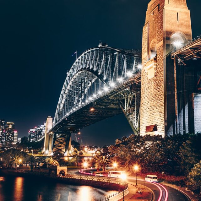 black and brown concrete bridge during night time